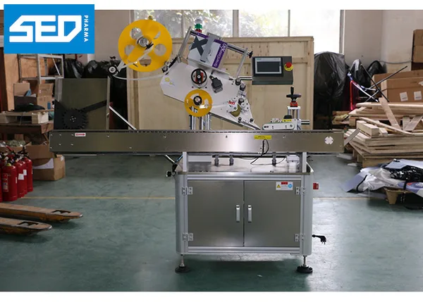 Horizontal Wrap Around Flat Surface Labeling Machine With Auto Feeding System, view 1